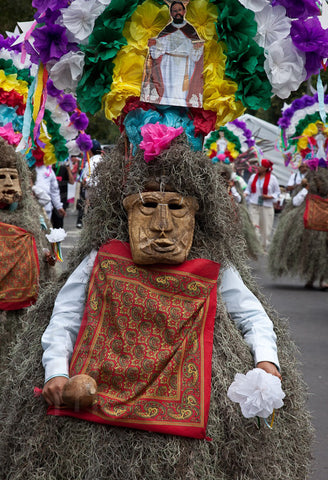 Man with mask at a parade